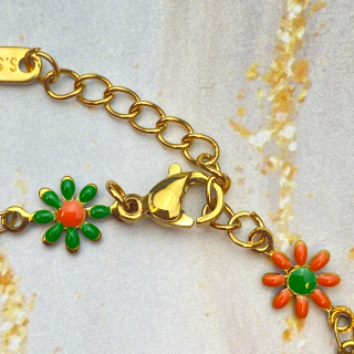 Kruikenstad armband bloemetjes RVS goud