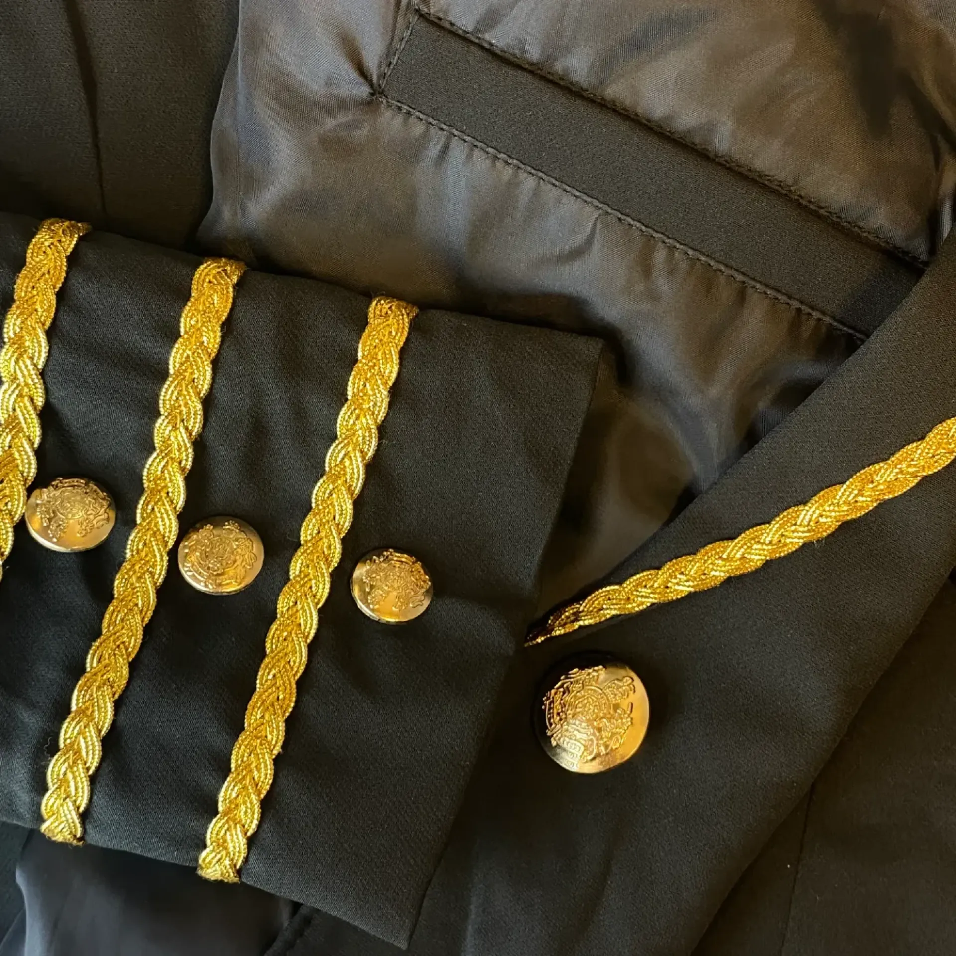 Kruikenstad jasje met embleem luxe.