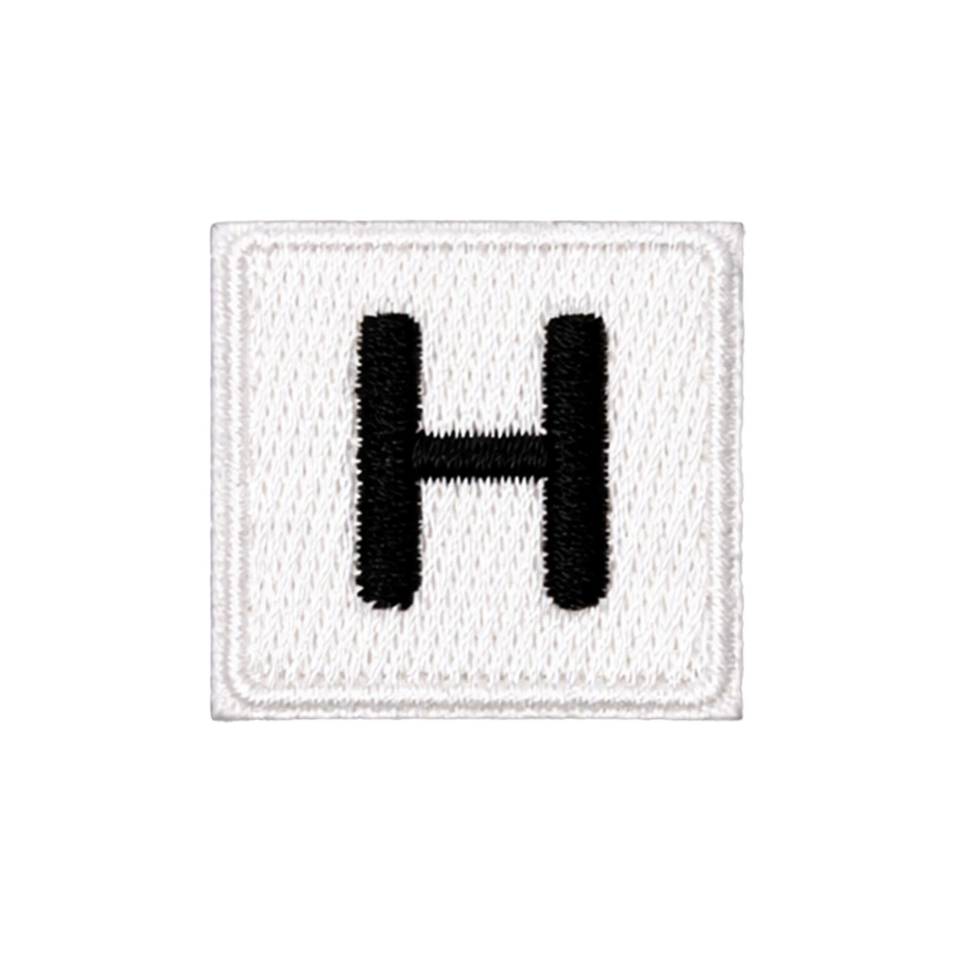Lampegat embleem Scrabble stijl letter H